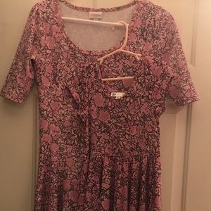 Mommy and me LuLaRoe dresses. Size small and 5/6